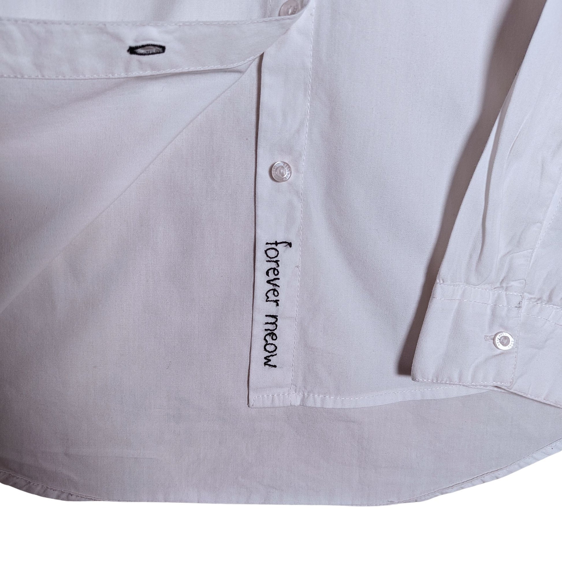 'Forever Meow' in seam embroidery close up